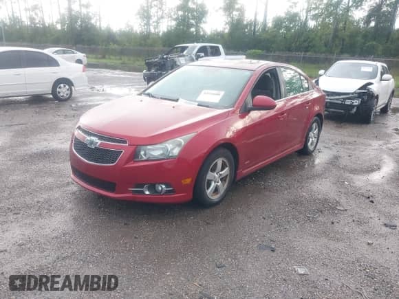 2014 Chevrolet Cruze 1LT with VIN 1G1PD5SBXE7386450, listed as a IAAI auction lot 42916000 with 117,916 mi miles and . Bid and sale history available at DreamBid. Image 2.