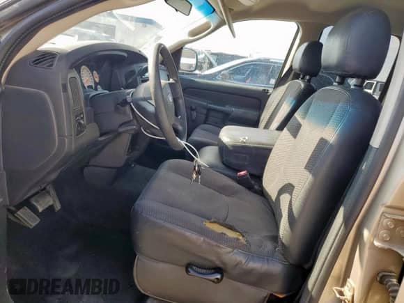 2004 Dodge 1500 SLT z VIN 1D7HA18N94S605477, wystawiony jako Copart lot #71927405 z przebiegiem 176 896 mil mil oraz Szkoda całkowita • Salvage title. Historia ofert i sprzedaży dostępna na DreamBid. Obrazek 7.