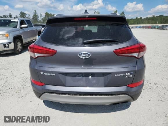 2018 Hyundai Tucson Value with VIN KM8J3CA26JU832025, listed as a Copart auction lot 70345475 with 120,400 mi miles and Salvage title. Bid and sale history available at DreamBid. Image 6.