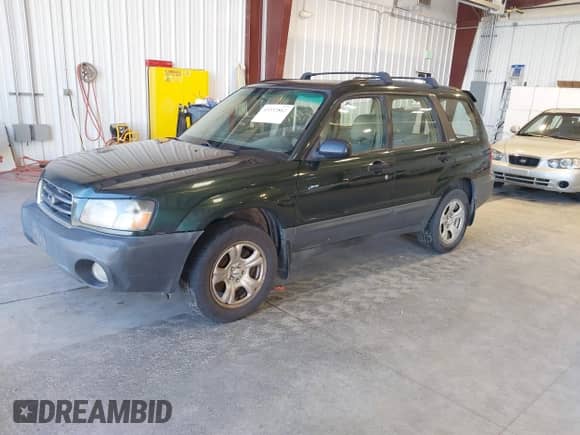 2003 Subaru Forester X with VIN JF1SG63633H720539, listed as a IAAI auction lot 43332862 with 305,928 mi miles and . Bid and sale history available at DreamBid. Image 2.