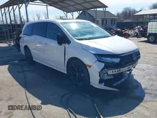 2023 Honda Odyssey Sport z VIN 5FNRL6H77PB063109, wystawiony jako IAAI lot #41760368 z przebiegiem 39 967 mil mil oraz . Historia ofert i sprzedaży dostępna na DreamBid. Obrazek 1.