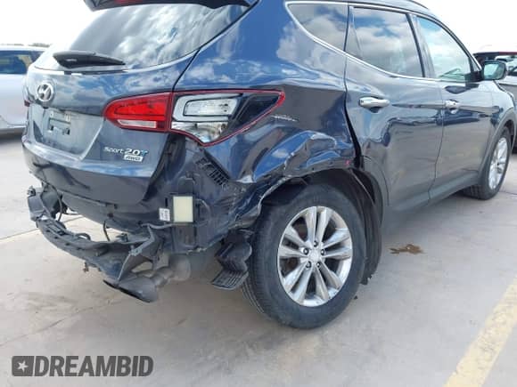 2018 Hyundai Santa Fe 2.0T с VIN 5NMZUDLA4JH107836, выставлен на аукционе IAAI как лот 43171498 с пробегом 120 309 миль миль и . История ставок и продаж доступна на DreamBid. Изображение 6.