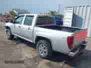 2011 Chevrolet Colorado 1LT z VIN 1GCHTCFEXB8131732, wystawiony jako IAAI lot #42595193 z przebiegiem 129 689 mil mil oraz . Historia ofert i sprzedaży dostępna na DreamBid. Obrazek 3.