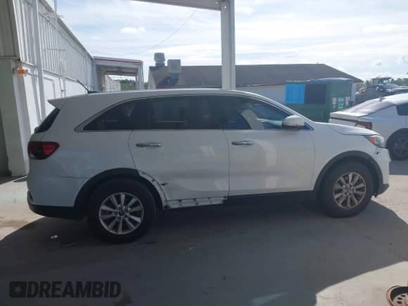 2019 Kia Sorento L с VIN 5XYPG4A30KG451775, выставлен на аукционе IAAI как лот 43265673 с пробегом 156 566 миль миль и . История ставок и продаж доступна на DreamBid. Изображение 13.