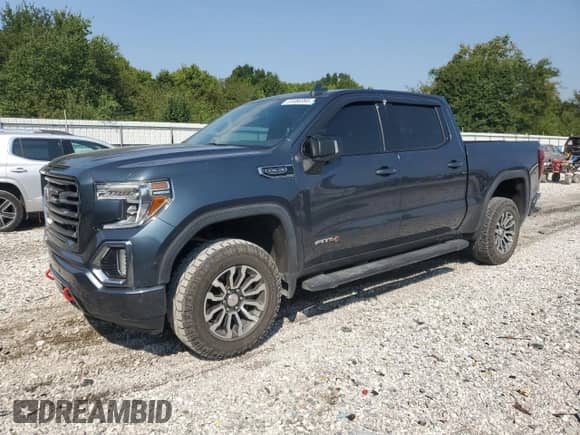 2019 GMC Sierra 1500 AT4 with VIN 3GTP9EED4KG226375, listed as a Copart auction lot 81086995 with 85,626 mi miles and Salvage title. Bid and sale history available at DreamBid. Image 1.