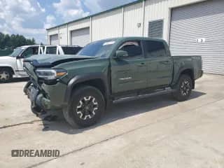 2021 Toyota Tacoma SR with VIN 5TFCZ5AN6MX245568, listed as a Copart auction lot 69282775 with 27,598 mi miles and Salvage title. Bid and sale history available at DreamBid. Image 1.