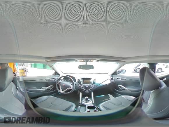 2012 Hyundai Veloster w/Black Int z VIN KMHTC6AD2CU032661, wystawiony jako Copart lot #64272815 z przebiegiem 71 216 mil mil oraz Szkoda całkowita • Salvage title. Historia ofert i sprzedaży dostępna na DreamBid. Obrazek 15.