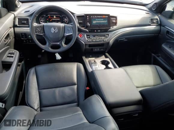 2024 Honda Passport EX-L with VIN 5FNYF8H5XRB018374, listed as a Copart auction lot 60676545 with 30,898 mi miles and Salvage title. Bid and sale history available at DreamBid. Image 8.