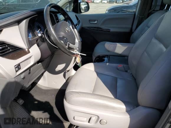 2018 Toyota Sienna XLE with VIN 5TDDZ3DC2JS205914, listed as a Copart auction lot 63795705 with 127,778 mi miles and Salvage title. Bid and sale history available at DreamBid. Image 7.