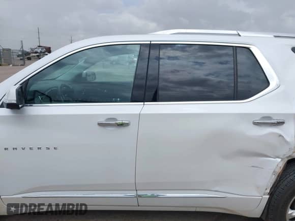 2021 Chevrolet Traverse High Country z VIN 1GNEVNKW9MJ215972, wystawiony jako IAAI lot #42566770 z przebiegiem 88 878 mil mil oraz . Historia ofert i sprzedaży dostępna na DreamBid. Obrazek 14.