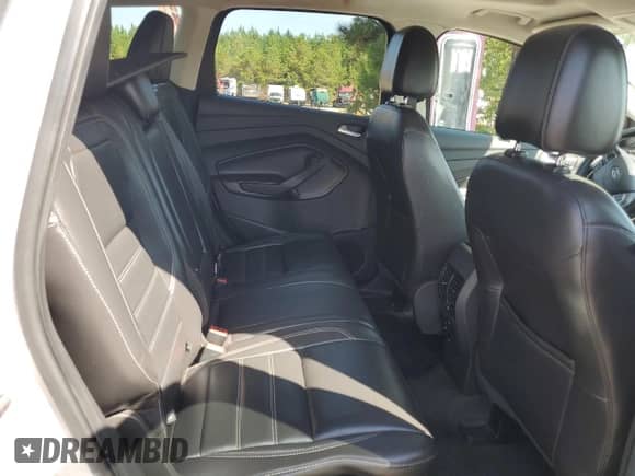 2017 Ford Escape Titanium с VIN 1FMCU0JD6HUA87521, выставлен на аукционе Copart как лот 81462865 с пробегом 112 781 миль миль и Чистый • Clean title. История ставок и продаж доступна на DreamBid. Изображение 10.