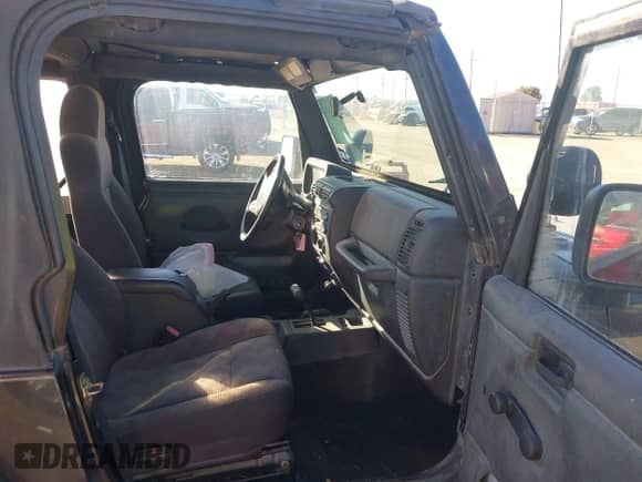 2003 Jeep Wrangler X with VIN 1J4FA39S63P330826, listed as a IAAI auction lot 41476438 with 146,517 mi miles and . Bid and sale history available at DreamBid. Image 5.