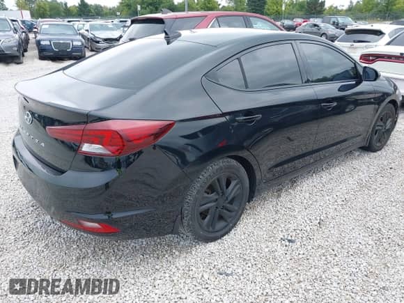 2019 Hyundai Elantra SEL with VIN 5NPD84LF7KH474597, listed as a IAAI auction lot 43106659 with 102,595 mi miles and . Bid and sale history available at DreamBid. Image 4.