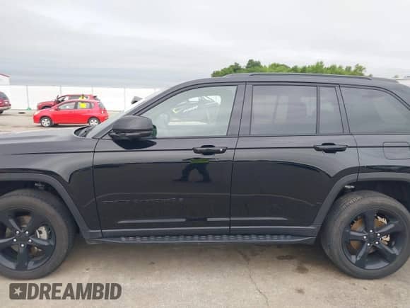 2023 Jeep Grand Cherokee Altitude with VIN 1C4RJGAG8PC648073, listed as a IAAI auction lot 42338453 with 30,505 mi miles and . Bid and sale history available at DreamBid. Image 14.