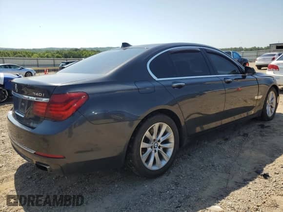 2015 BMW 7 Series 740i с VIN WBAYA6C52FD827068, выставлен на аукционе Copart как лот 61811055 с пробегом 192 299 миль миль и Списание • Salvage title. История ставок и продаж доступна на DreamBid. Изображение 3.