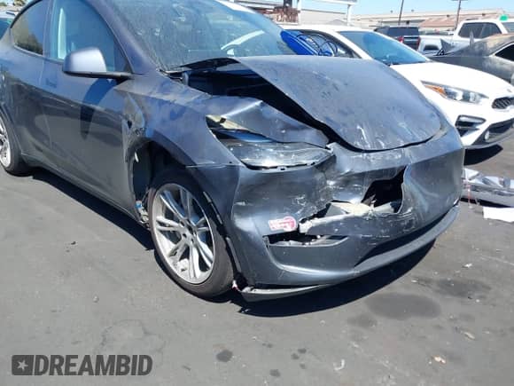 2023 Tesla Model Y Long Range with VIN 7SAYGDEE5PF865572, listed as a IAAI auction lot 43067262 with 56,508 mi miles and . Bid and sale history available at DreamBid. Image 6.