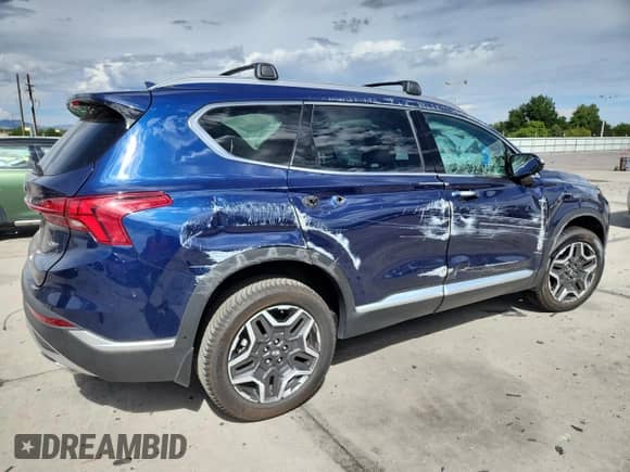 2023 Hyundai Santa Fe Limited с VIN 5NMS4DAL9PH504621, выставлен на аукционе Copart как лот 80128635 с пробегом 32 392 миль миль и Списание • Salvage title. История ставок и продаж доступна на DreamBid. Изображение 3.