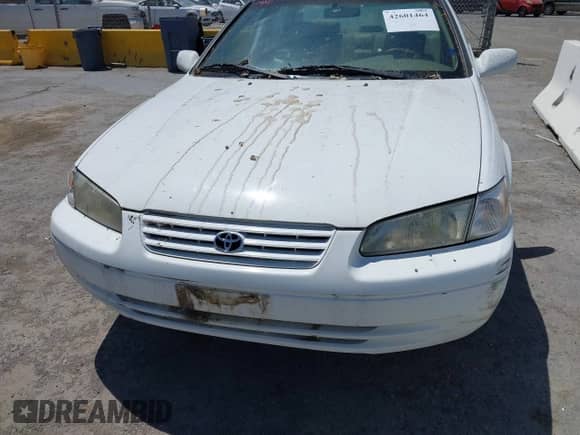 1997 Toyota Camry LE z VIN 4T1BF22K2VU921133, wystawiony jako IAAI lot #42601464 z przebiegiem 221 941 mil mil oraz . Historia ofert i sprzedaży dostępna na DreamBid. Obrazek 6.