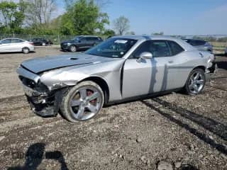 2010 Dodge Challenger R/T with VIN 2B3CJ5DT3AH184599, listed as a Copart auction lot 55896415 with 146,988 mi miles and Non repairable. Bid and sale history available at DreamBid. Image 1.