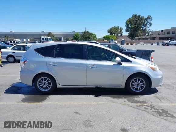 2012 Toyota Prius Two z VIN JTDZN3EU0C3122883, wystawiony jako IAAI lot #42934945 z przebiegiem Nie podano mil oraz . Historia ofert i sprzedaży dostępna na DreamBid. Obrazek 13.