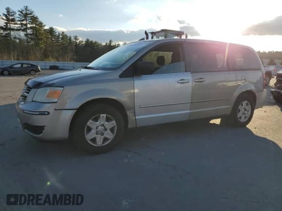 2009 Dodge Caravan with VIN 208HN44EX9R651559, listed as a Copart auction lot 45508355 with 127,852 mi miles and Non repairable. Bid and sale history available at DreamBid. Image 1.