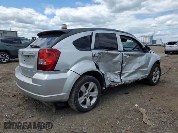 2010 Dodge Caliber Mainstreet with VIN 1B3CB3HA4AD542591, listed as a Copart auction lot 70044515 with Not provided miles and Salvage title. Bid and sale history available at DreamBid. Image 3.
