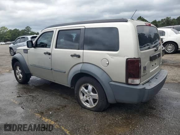 2008 Dodge Nitro SXT z VIN 1D8GU28K48W185510, wystawiony jako Copart lot #70859474 z przebiegiem 195 355 mil mil oraz Szkoda całkowita • Salvage title. Historia ofert i sprzedaży dostępna na DreamBid. Obrazek 2.
