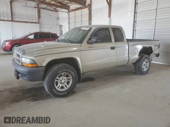 2003 Dodge Dakota с VIN 1D7HG12X93S135958, выставлен на аукционе Copart как лот 47621065 с пробегом 63 447 миль миль и Списание • Salvage title. История ставок и продаж доступна на DreamBid. Изображение 1.