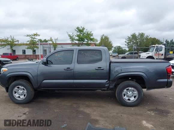 2023 Toyota Tacoma SR with VIN 3TMCZ5ANXPM538495, listed as a IAAI auction lot 42993850 with 41,728 mi miles and . Bid and sale history available at DreamBid. Image 15.