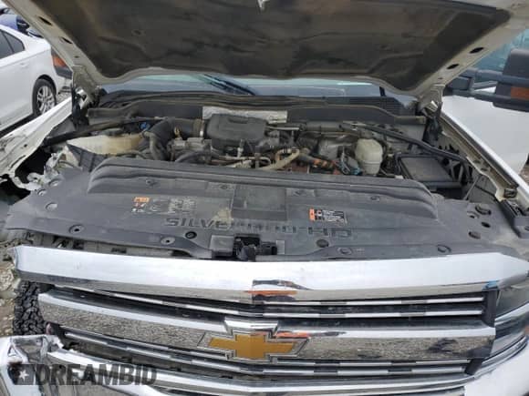 2016 Chevrolet Silverado 2500HD Work Truck z VIN 1GC1KUE84GF139477, wystawiony jako Copart lot #69049734 z przebiegiem 139 037 mil mil oraz Szkoda całkowita • Salvage title. Historia ofert i sprzedaży dostępna na DreamBid. Obrazek 12.