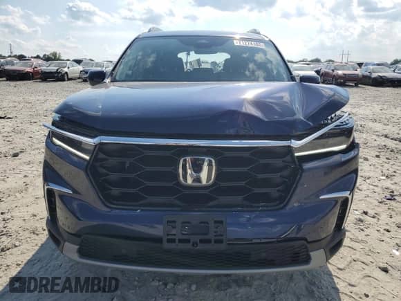 2025 Honda Pilot Touring с VIN 5FNYG2H70SB016215, выставлен на аукционе Copart как лот 71274185 с пробегом 3 602 миль миль и Списание • Salvage title. История ставок и продаж доступна на DreamBid. Изображение 5.