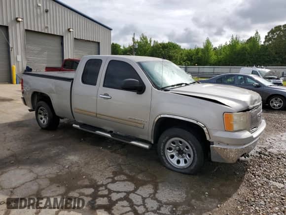 2007 GMC Sierra 1500 SLE1 with VIN 1GTEC19C77Z509816, listed as a Copart auction lot 54752725 with 194,520 mi miles and Salvage title. Bid and sale history available at DreamBid. Image 4.