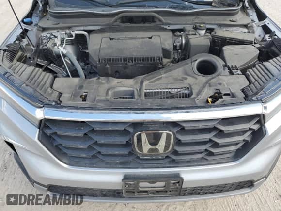 2023 Honda Pilot EX-L z VIN 5FNYG2H5XPB007737, wystawiony jako Copart lot #77710854 z przebiegiem 22 262 mil mil oraz Szkoda całkowita • Salvage title. Historia ofert i sprzedaży dostępna na DreamBid. Obrazek 12.