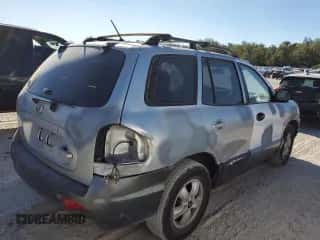 2005 Hyundai Santa Fe GLS с VIN KM8SC13D35U999519, выставлен на аукционе Copart как лот 81822914 с пробегом 211 766 миль миль и Списание • Salvage title. История ставок и продаж доступна на DreamBid. Изображение 3.