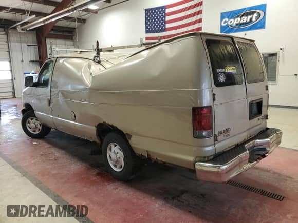 2013 Ford Econoline Cargo Commercial с VIN 1FTSS3EL5DDA33484, выставлен на аукционе Copart как лот 57722635 с пробегом 297 943 миль миль и Списание • Salvage title. История ставок и продаж доступна на DreamBid. Изображение 2.