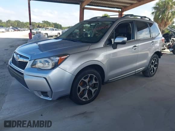 2016 Subaru Forester XT Touring with VIN JF2SJGXC1GH405232, listed as a IAAI auction lot 43370477 with 201,225 mi miles and . Bid and sale history available at DreamBid. Image 18.