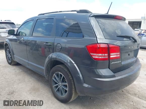 2018 Dodge Journey SE with VIN 3C4PDCAB2JT447552, listed as a IAAI auction lot 42982191 with 75,862 mi miles and . Bid and sale history available at DreamBid. Image 3.