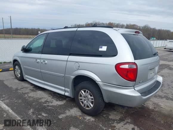 2005 Dodge Grand Caravan with VIN 2D8GP24R65R343635, listed as a IAAI auction lot 41932889 with 143,620 mi miles and . Bid and sale history available at DreamBid. Image 3.