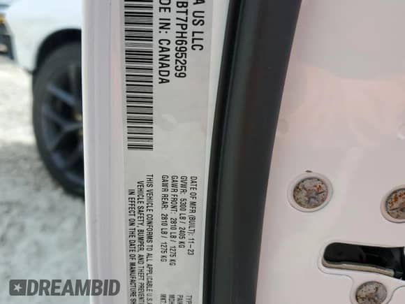 2023 Dodge Challenger R/T with VIN 2C3CDZBT7PH695259, listed as a Copart auction lot 71323165 with 7,741 mi miles and Salvage title. Bid and sale history available at DreamBid. Image 12.