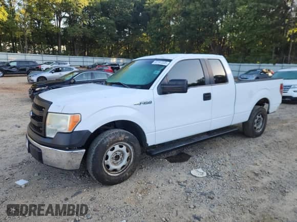 2014 Ford F-150 XL with VIN 1FTEX1CM7EKG36822, listed as a Copart auction lot 82197335 with 184,300 mi miles and Salvage title. Bid and sale history available at DreamBid. Image 1.