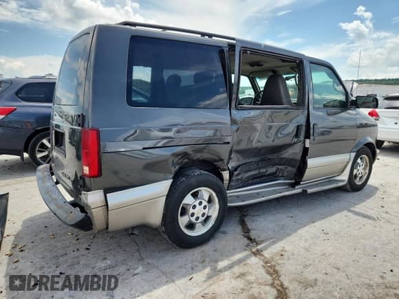 2003 Chevrolet Astro с VIN 1GNDM19X03B131473, выставлен на аукционе Copart как лот 64868565 с пробегом 107 042 миль миль и Списание • Salvage title. История ставок и продаж доступна на DreamBid. Изображение 3.