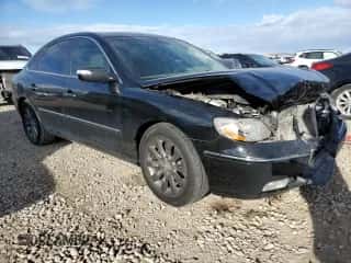 2009 Hyundai Azera Limited с VIN KMHFC46F09A342765, выставлен на аукционе Copart как лот 84087924 с пробегом 151 315 миль миль и Списание • Salvage title. История ставок и продаж доступна на DreamBid. Изображение 4.