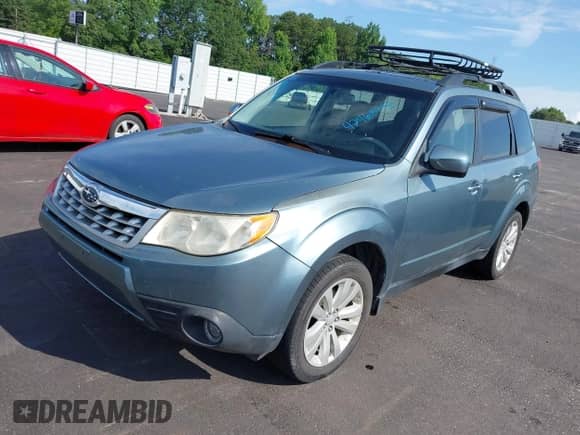 2012 Subaru Forester X Limited z VIN JF2SHBEC0CH420297, wystawiony jako IAAI lot #42468792 z przebiegiem 170 820 mil mil oraz . Historia ofert i sprzedaży dostępna na DreamBid. Obrazek 2.