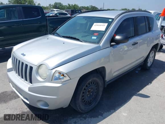 2008 Jeep Compass Sport с VIN 1J8FT47048D767281, выставлен на аукционе IAAI как лот 42010343 с пробегом 164 734 миль миль и . История ставок и продаж доступна на DreamBid. Изображение 2.