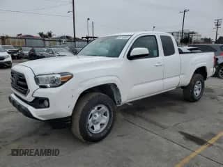 2023 Toyota Tacoma SR with VIN 3TYRZ5CN9PT026979, listed as a Copart auction lot 85715965 with 70,943 mi miles and Salvage title. Bid and sale history available at DreamBid. Image 1.