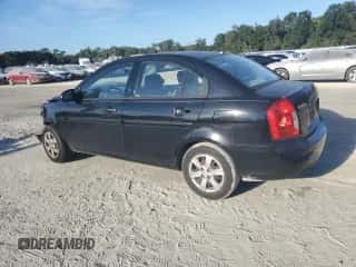 2009 Hyundai Accent Auto GLS z VIN KMHCN46C69U287255, wystawiony jako Copart lot #82108655 z przebiegiem 195 612 mil mil oraz Nie do naprawy • Non repairable. Historia ofert i sprzedaży dostępna na DreamBid. Obrazek 2.