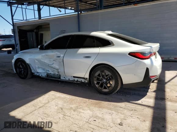 2022 BMW i4 eDrive40 с VIN WBY73AW08NFN06228, выставлен на аукционе Copart как лот 80496465 с пробегом 47 764 миль миль и Списание • Salvage title. История ставок и продаж доступна на DreamBid. Изображение 2.