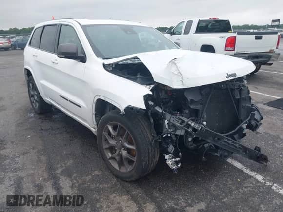 2021 Jeep Grand Cherokee 80th Anniversary z VIN 1C4RJFBG2MC568028, wystawiony jako IAAI lot #42381104 z przebiegiem 51 027 mil mil oraz . Historia ofert i sprzedaży dostępna na DreamBid. Obrazek 1.