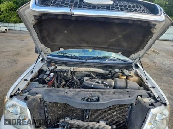 2007 Ford F-150 STX with VIN 1FTRX12W57FA37403, listed as a Copart auction lot 84213265 with 2,342,455 mi miles and Salvage title. Bid and sale history available at DreamBid. Image 11.