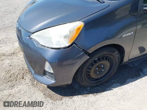 2012 Toyota Prius One z VIN JTDKDTB30C1023511, wystawiony jako IAAI lot #42778754 z przebiegiem 168 321 mil mil oraz . Historia ofert i sprzedaży dostępna na DreamBid. Obrazek 19.